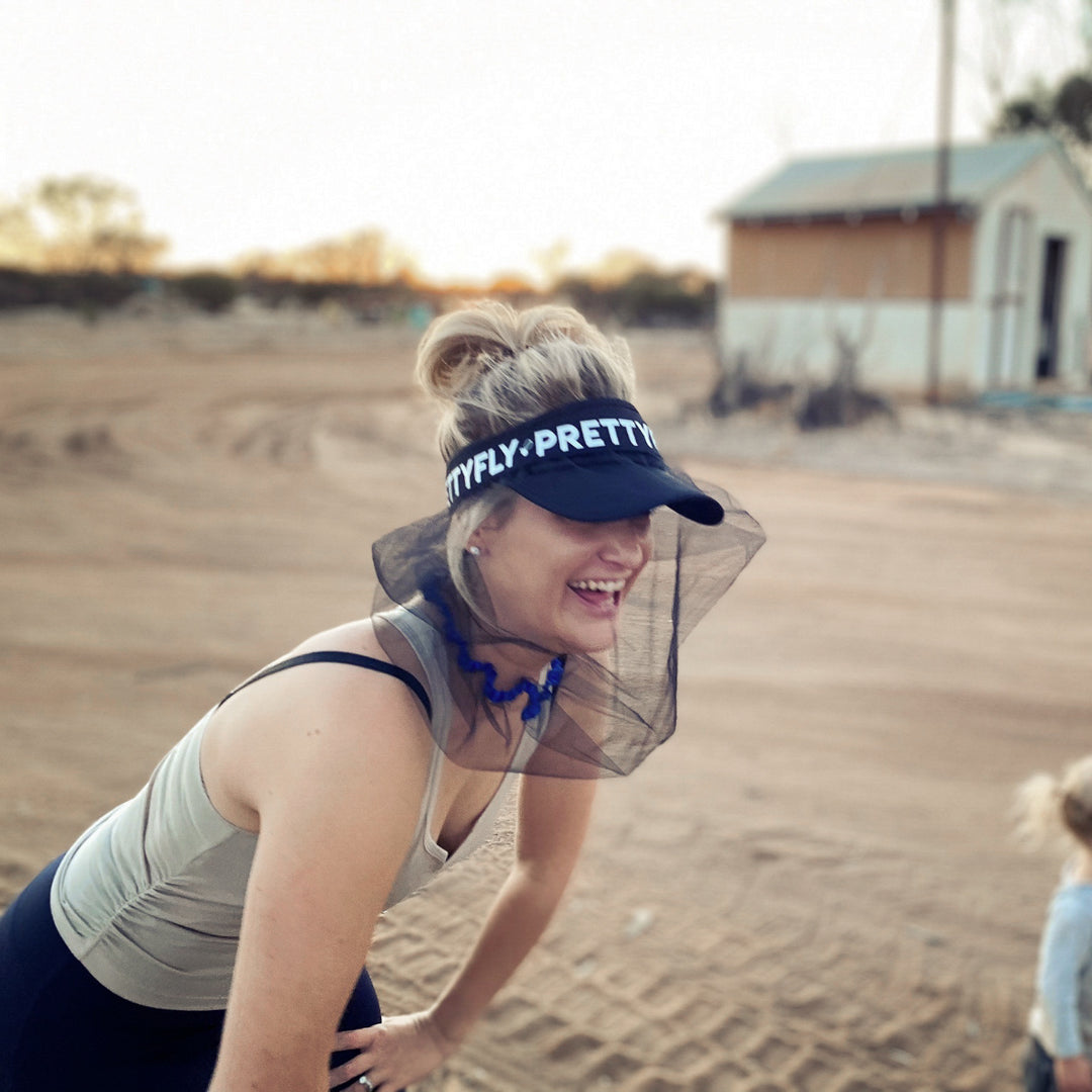Black fitness fly net over running cap