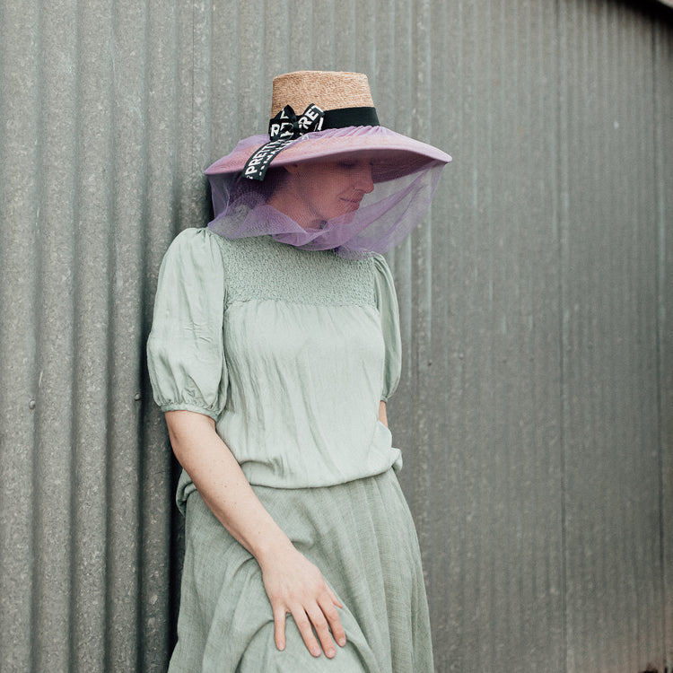 Women's purple fly net for hat