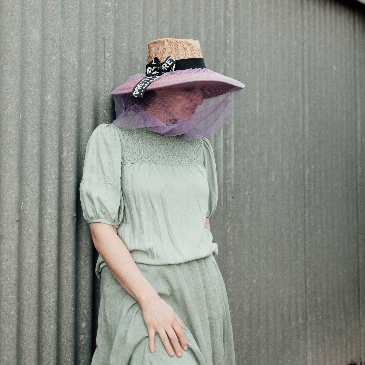 Women's purple fly net for hat